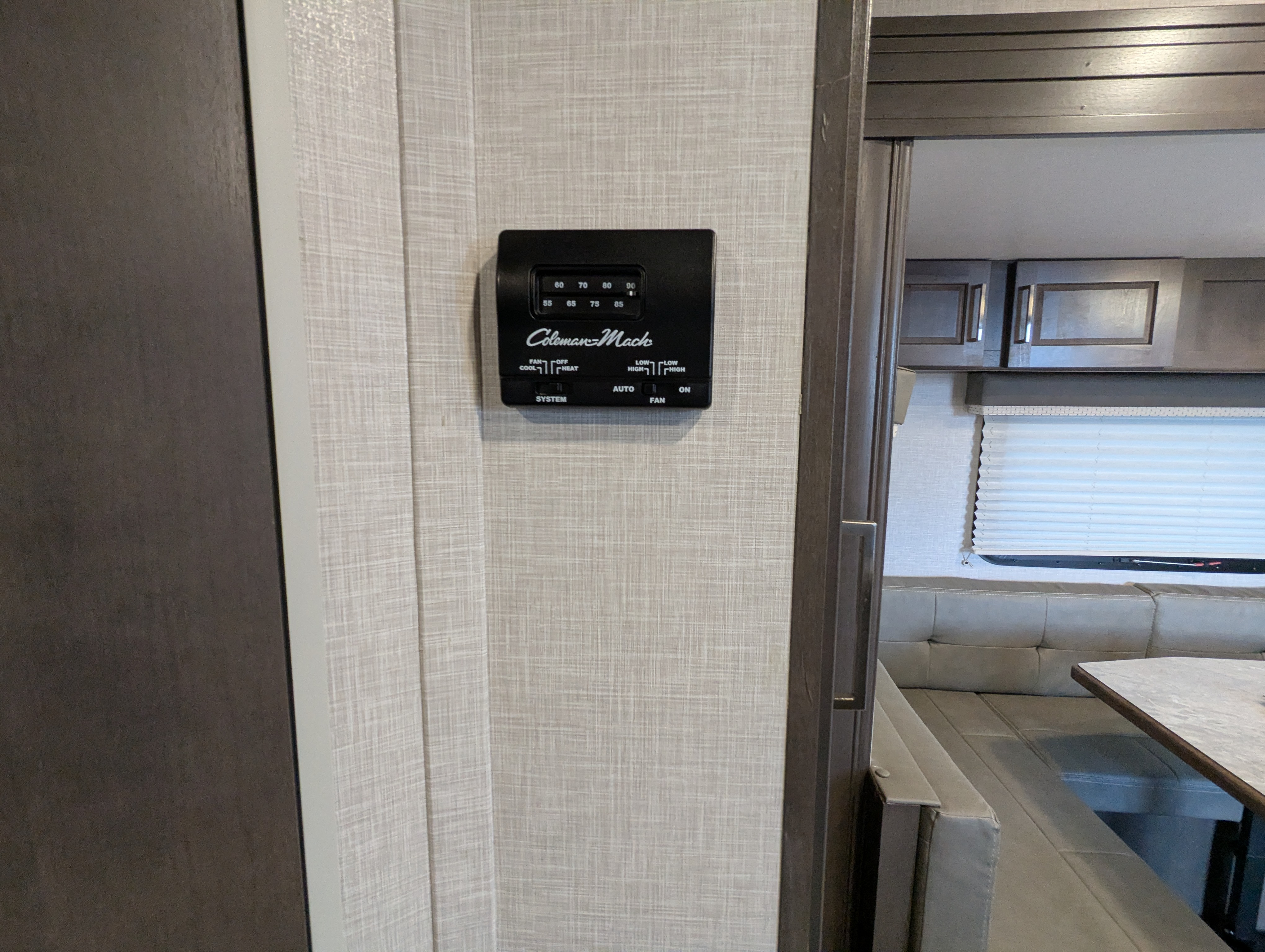 Coleman-Mach thermostat control panel