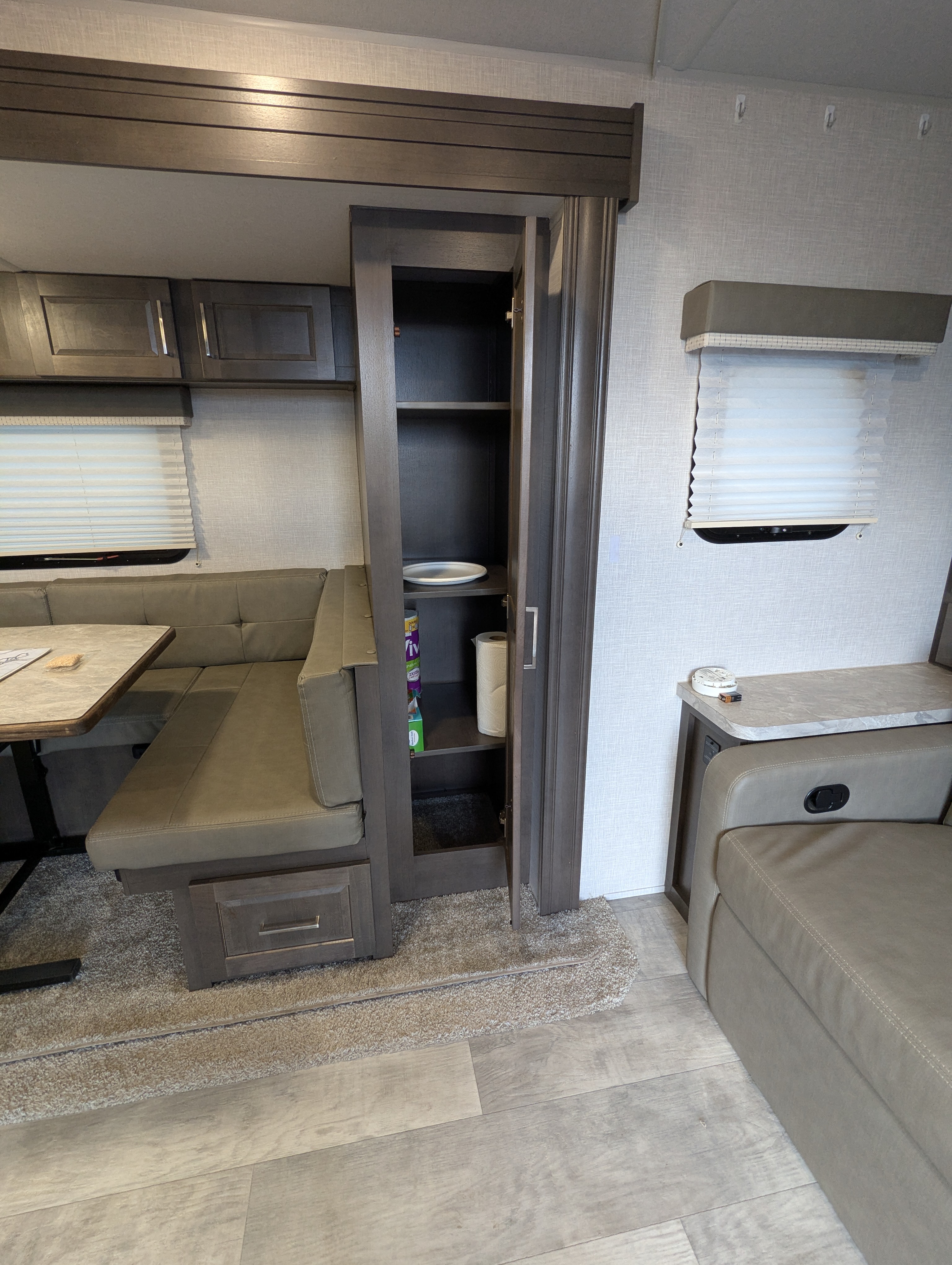 Hallway — dinette to bathroom with storage